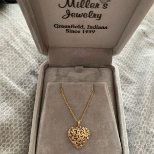 14k gold and diamond heart necklace.